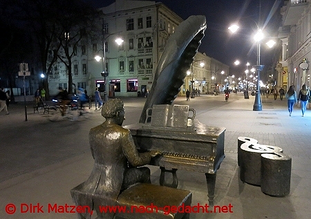 Lodz, eine Bronzefigur in der ulica Piotrkowska